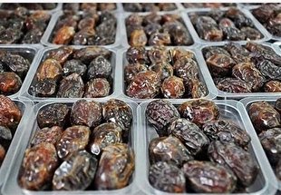 توزیع خرمای مضافتی طرح تنظیم بازار به مناسبت ماه مبارک رمضان