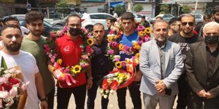 استقبال از قهرمان و مربی کشتی نوجوانان جهان در قائم شهر